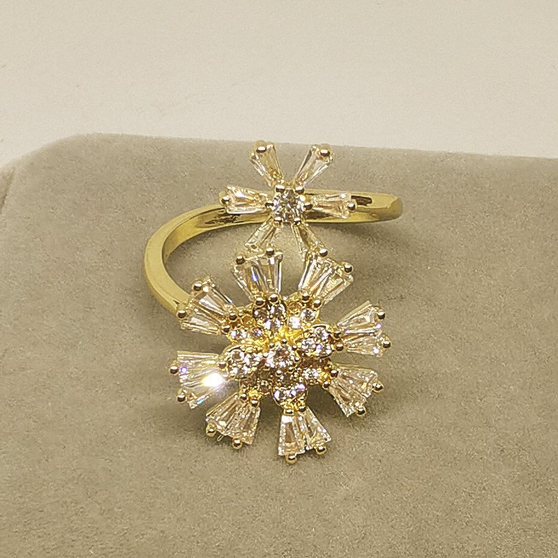 31ad0a50-aa68-476c-bba5-cd3f084bb735.jpg Swivel Crystal Snowflake Rings Are Versatile - Image 1